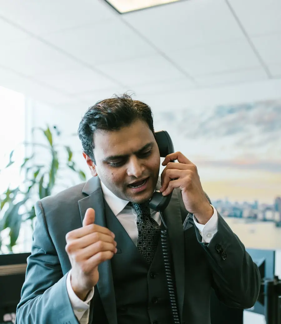 Accountant on a phone call in a modern office