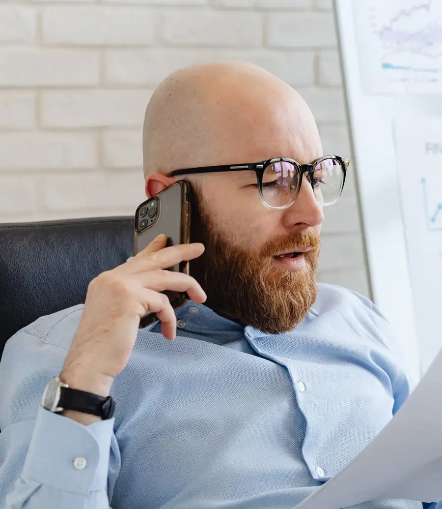 Adviser reviewing an account statement while on a phone call