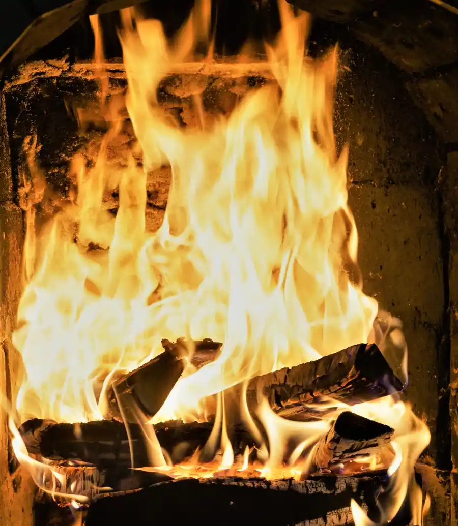 Wood fire burning in a home fireplace