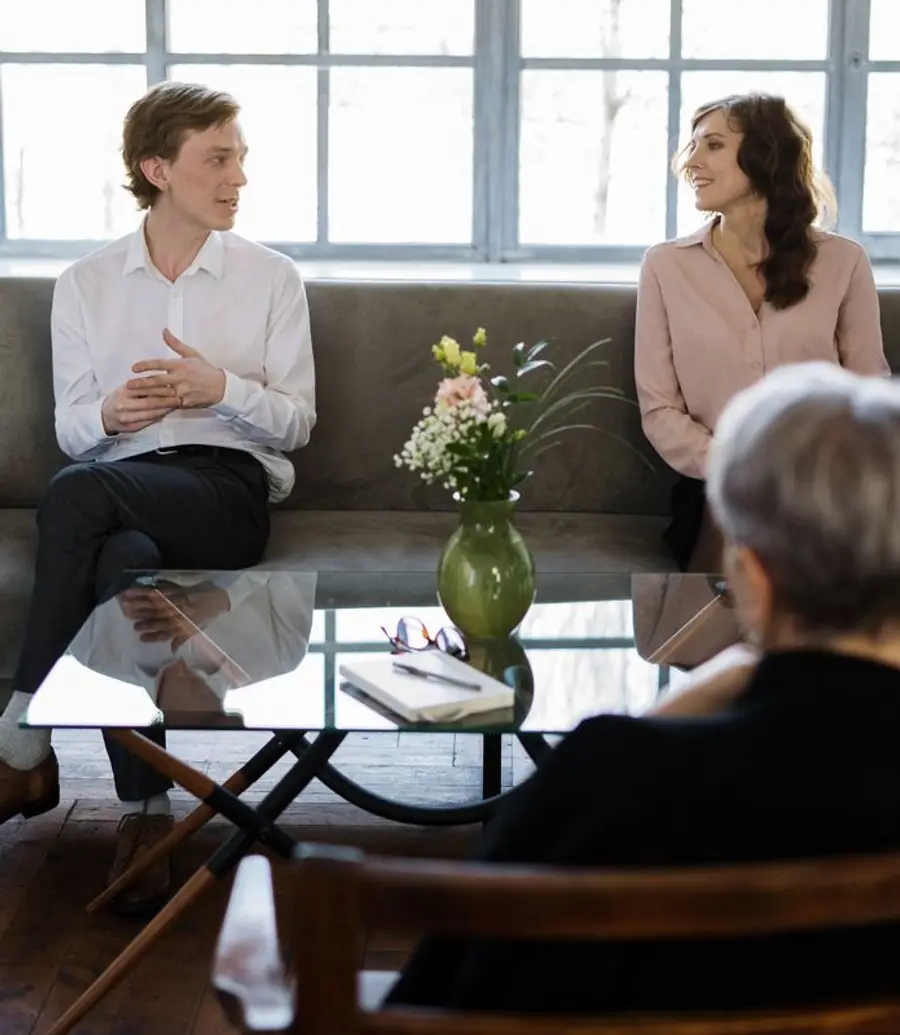 A professional financial consultation taking place in a bright room